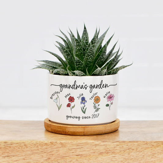 custom printed mini white ceramic planter with grandmas garden printed along with birth flowers for each grandchild